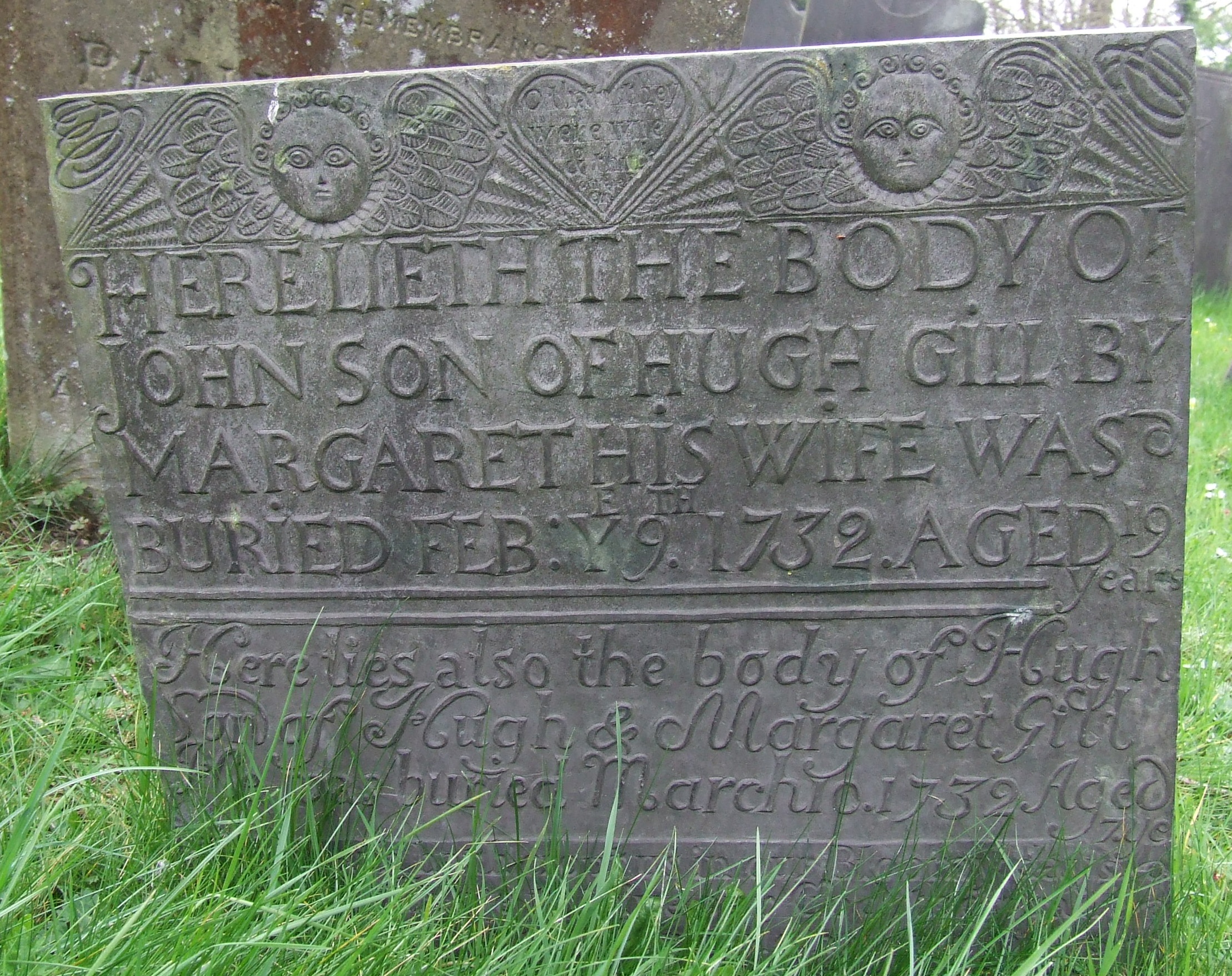 Headstone with two cherubs
